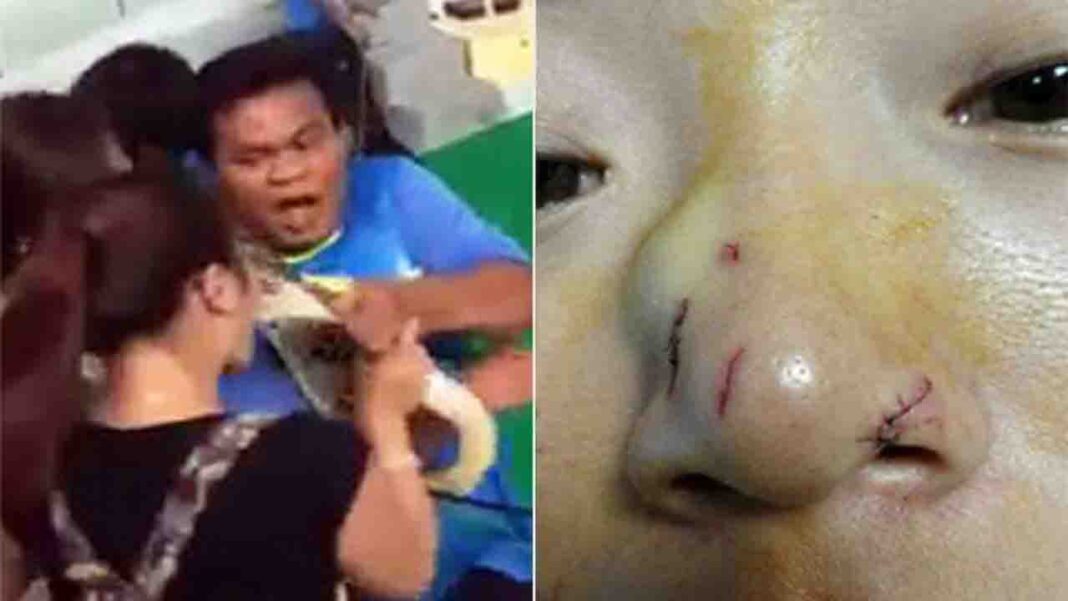 A woman tourist’s horror of kissing a snake. A woman tourist’s horror of kissing a snake.