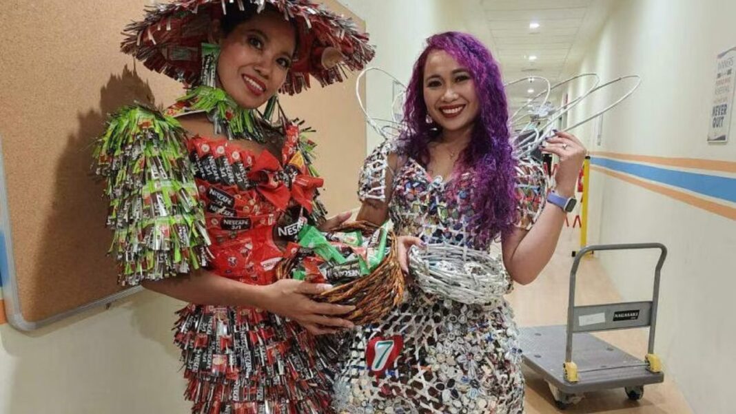 Filipino maids in Singapore model gowns created from rubbish Filipino maids in Singapore model gowns created from rubbish