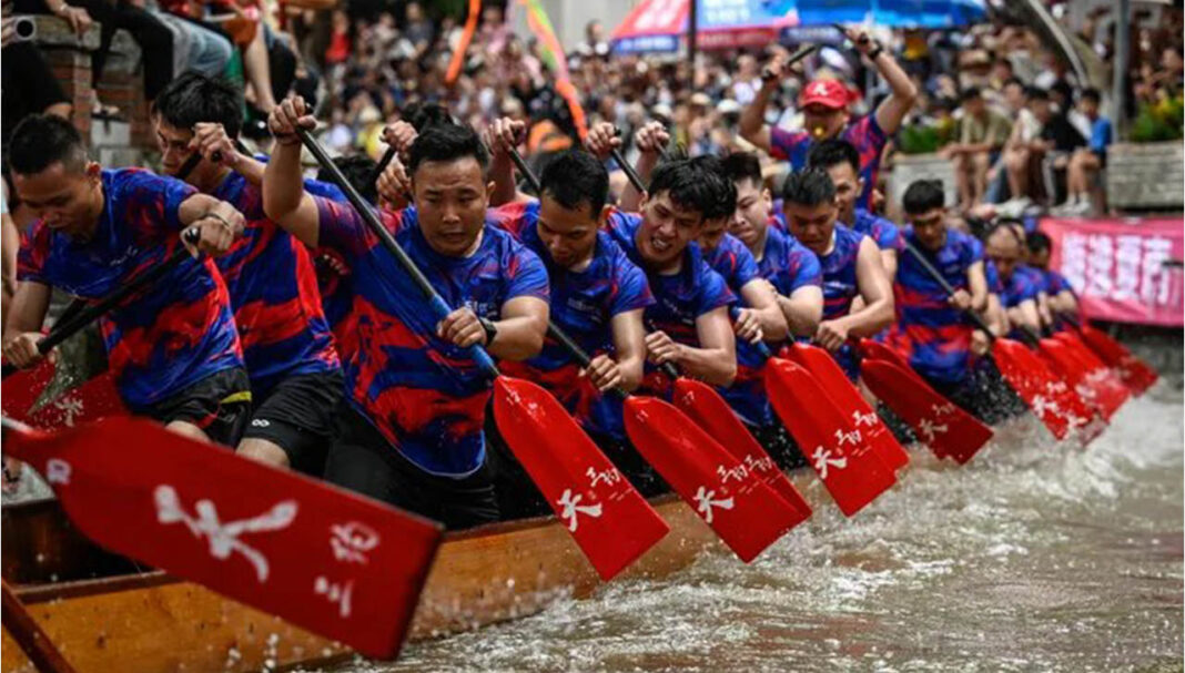 Racing in dragon boats Racing in dragon boats