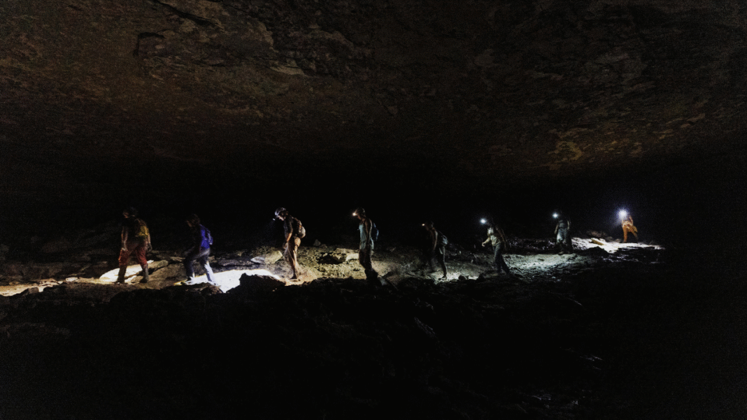 8 Cave Horror Movies So Claustrophobic You’ll Never Want to Go Underground Again